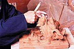 面シーサーのひねり成形